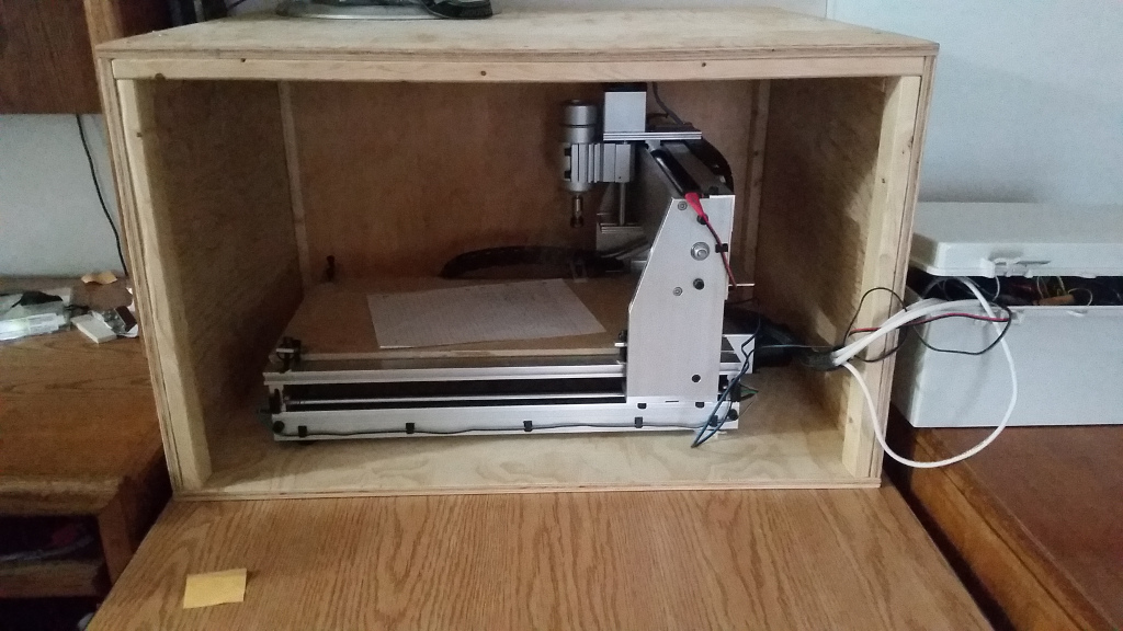 Test-fitting the machine in the enclosure