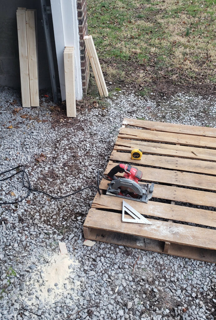 Using a pallet as a circular saw platform.