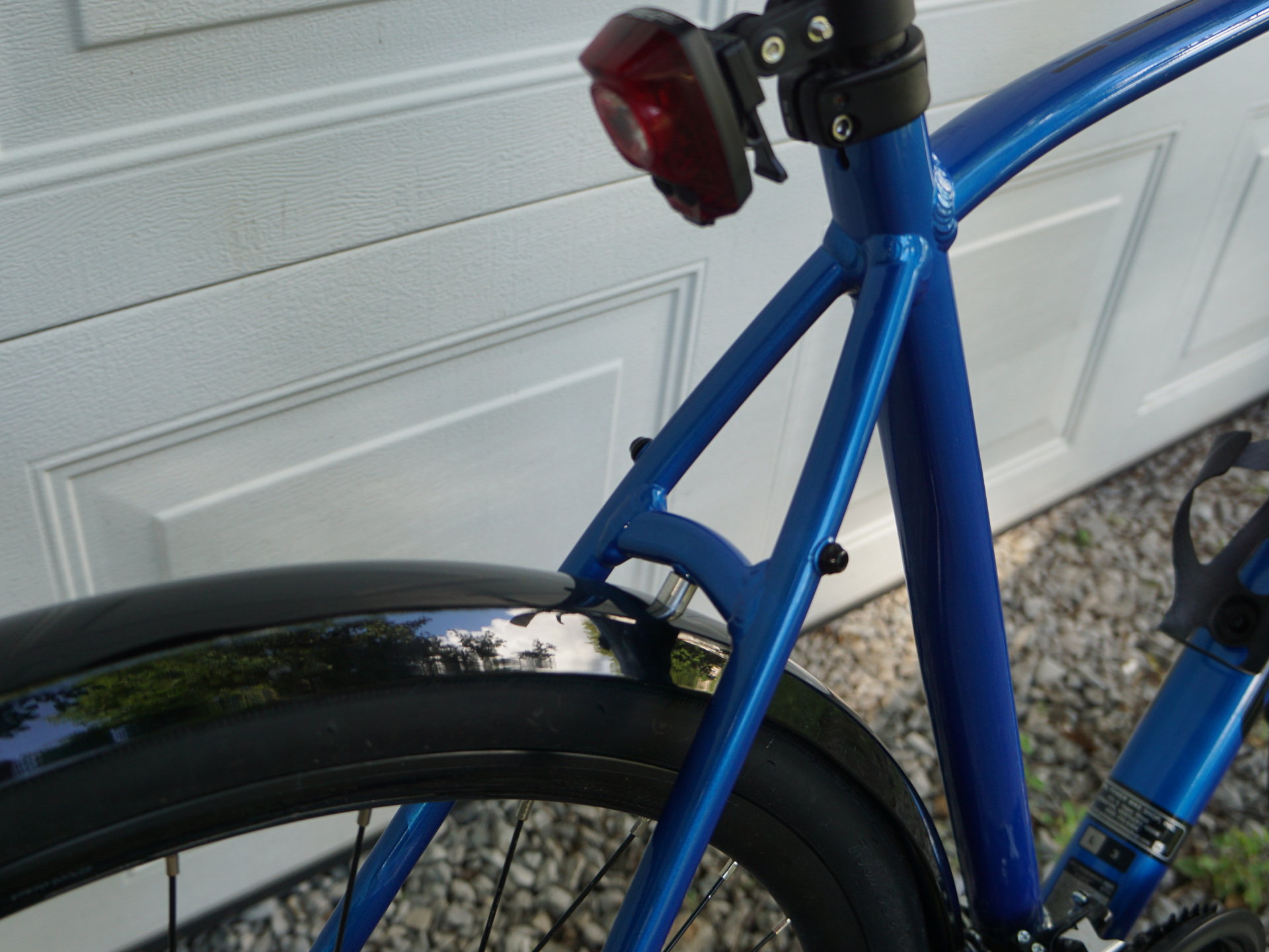 Fender attached to seat stay bridge, with DIY spacer