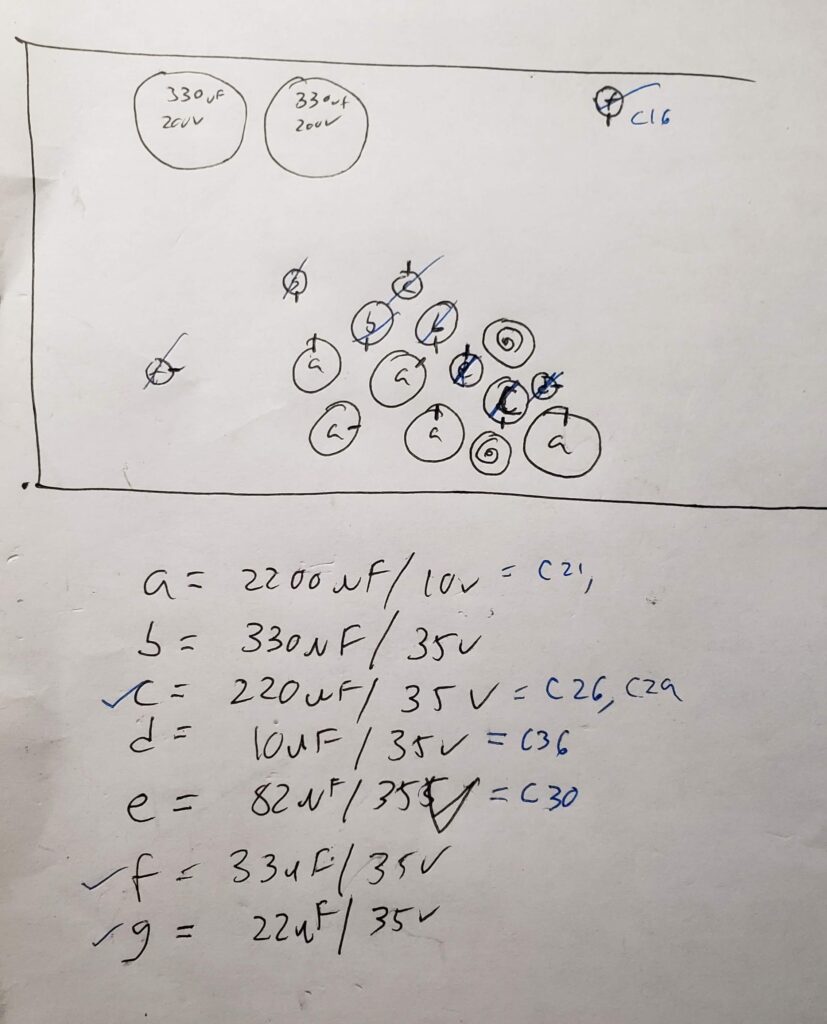 My handwritten notes while removing/replacing capacitors. Dashes denote negative terminal orientation.