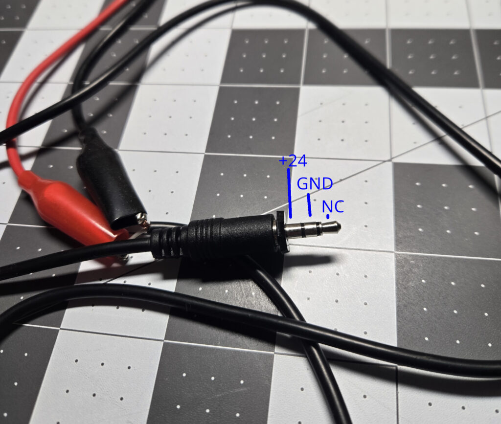 Close up of the 3.5MM TRS connector used as a power input on many Powerbooks