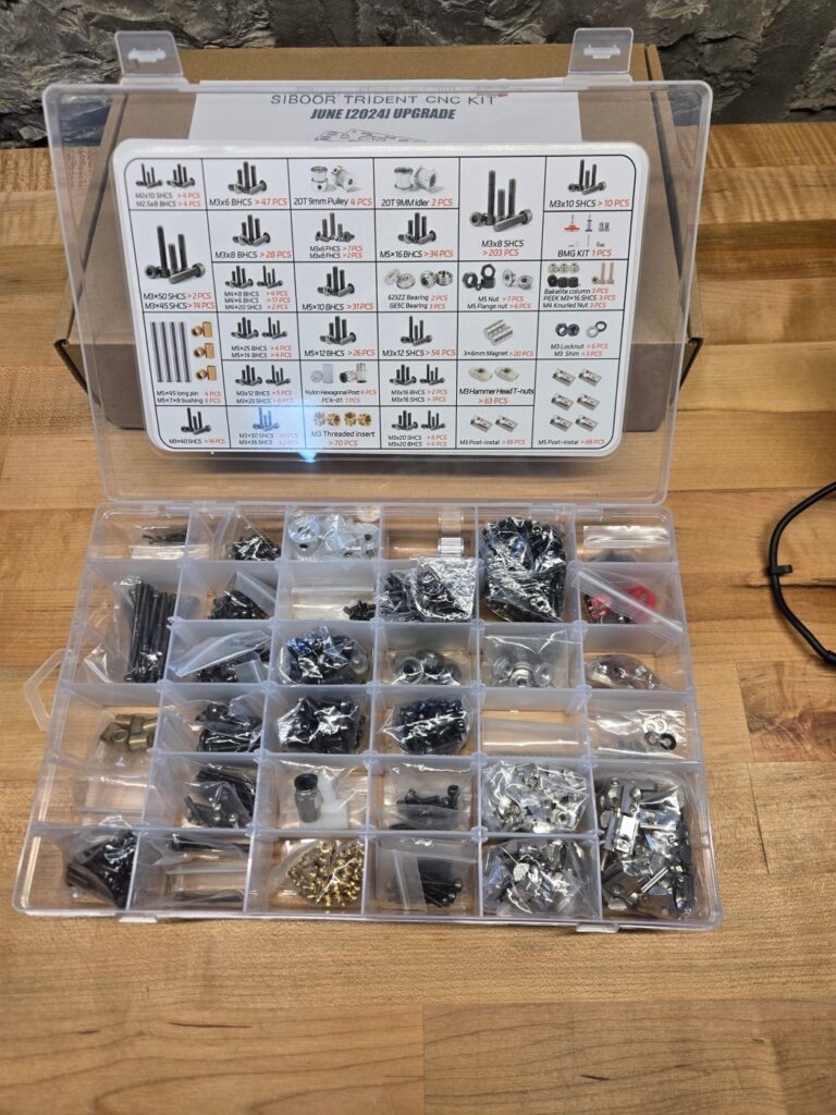 The hardware kit.  Great labeling, extras for common parts... and no 5x45 pins.